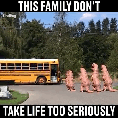 family dressed as dinosaurs