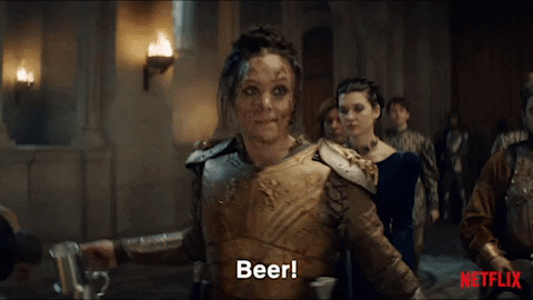 Gif from Netflix's The Witcher, a character in armor and she's screaming for beer.
