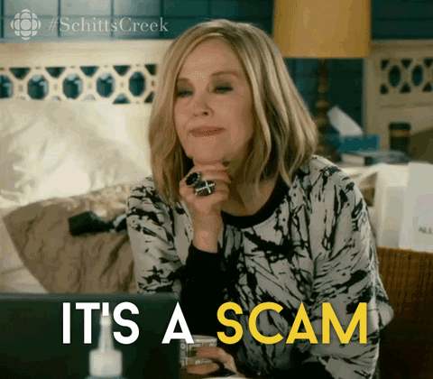 gif of moira from shitts creek saying "it's a scam"